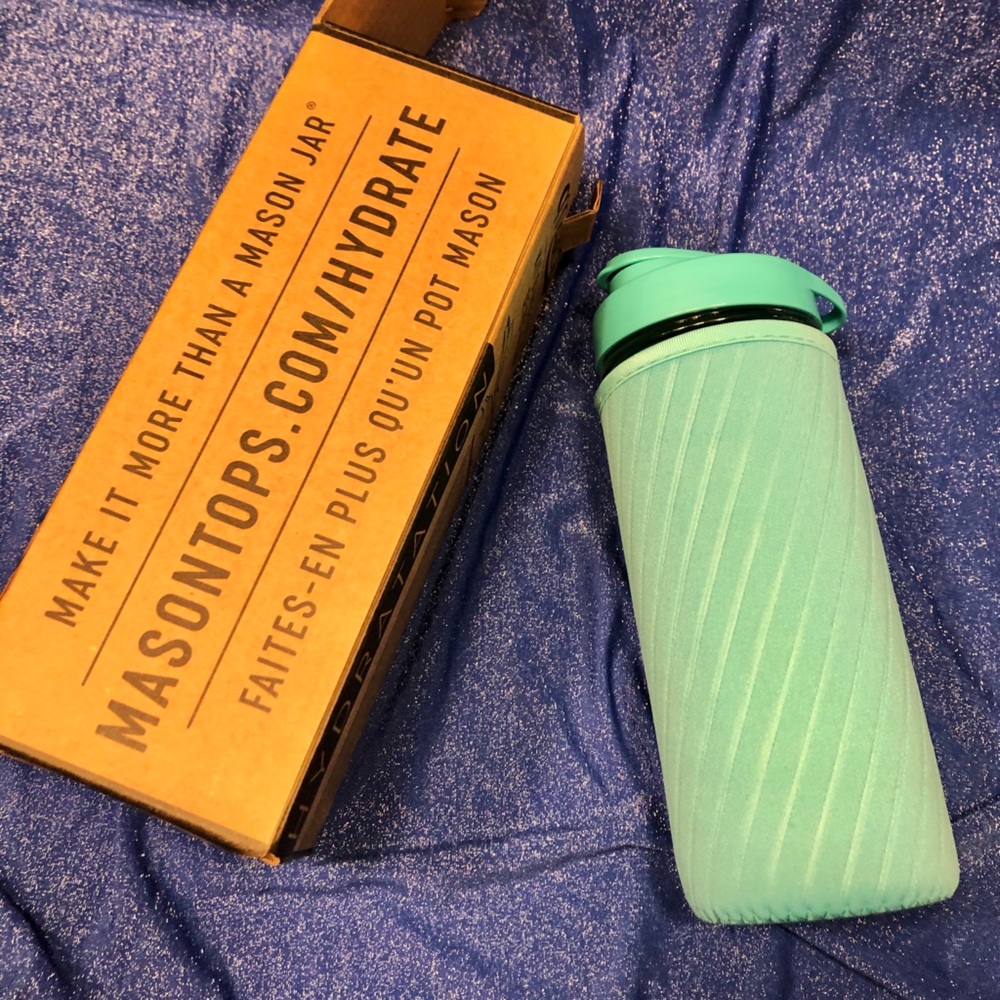 Masontops teal glass water bottle.